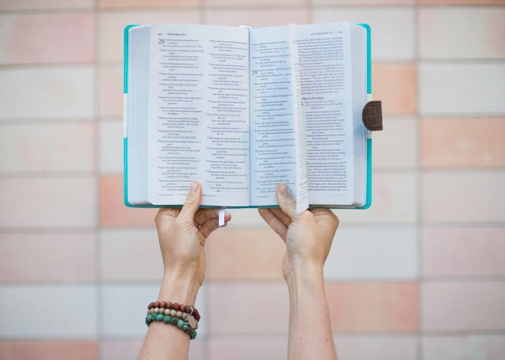 woman reading a bible