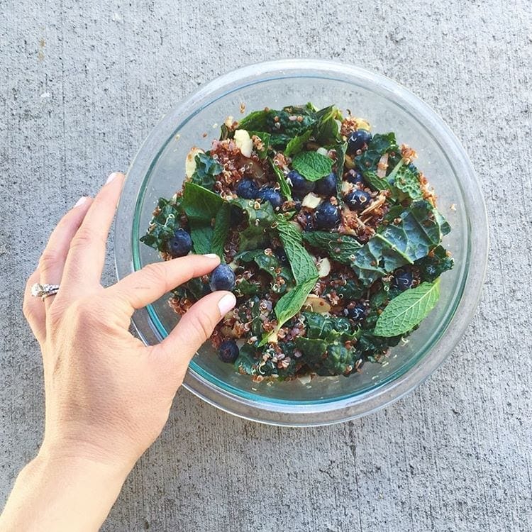 blueberry kale quinoa salad in a bowl