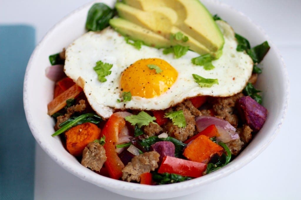 forget oatmeal, this sweet potato, turkey sausage, egg bowl has you covered for breakfast, lunch or dinner! this savory power bowl is packed with nutritional superstars -- sweet potato, avocado, turkey sausage, greens, and eggs | www.nourishmovelove.com