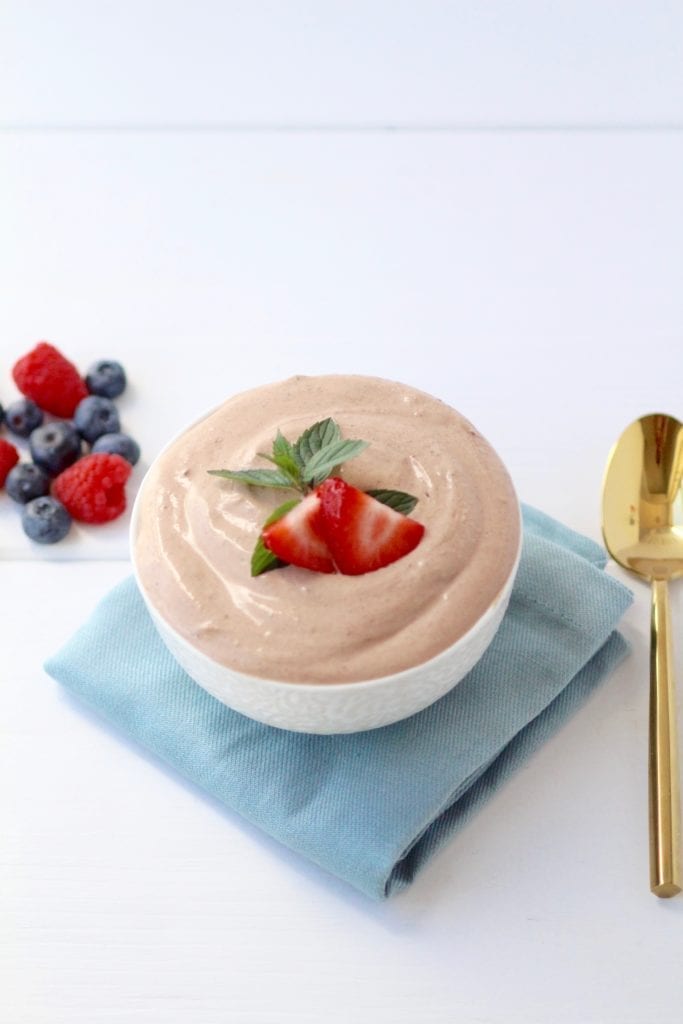 chocolate collagen mousse topped with strawberries
