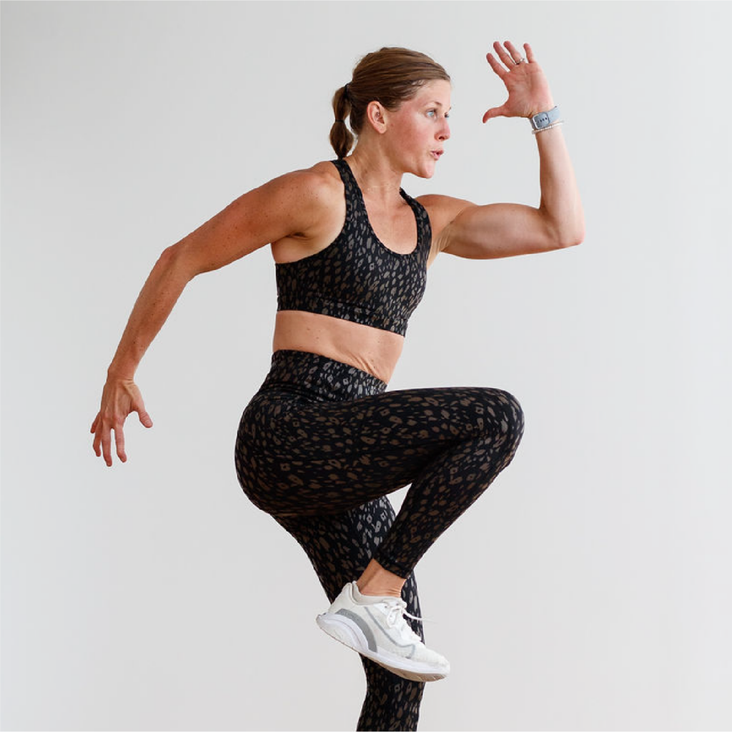 woman performing lunge jump