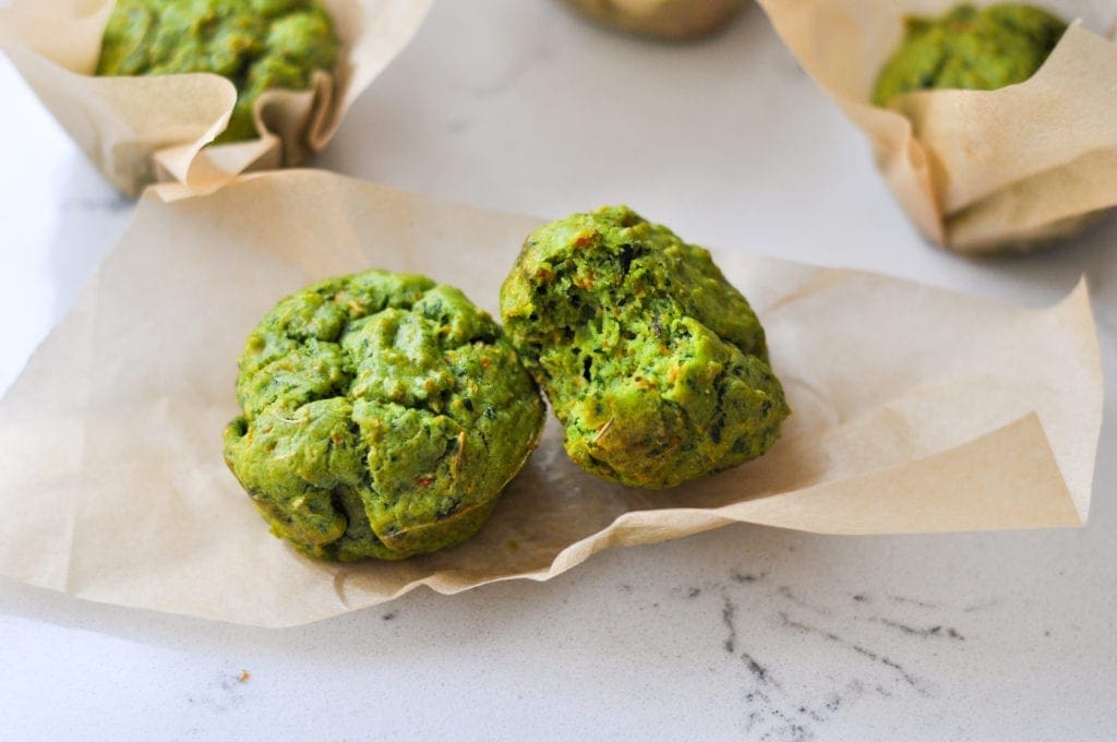Savory Spinach Muffins on parchment paper