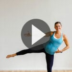 Pregnant woman performing cardio exercises in a low impact cardio barre workout