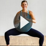 Pregnant woman performing cardio exercises in a low impact cardio barre workout