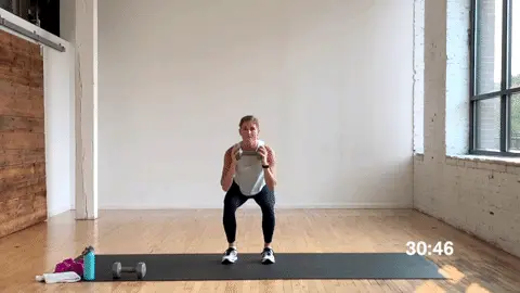 2 pulse squats and 2 press jacks with dumbbell
