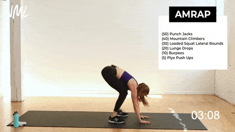 woman performing burpees to burn fat