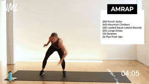woman performing loaded squat lateral bounds in a HIIT cardio workout at home