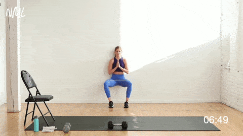 Wall sit with resistance band lower body burnout