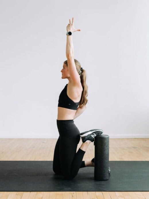 Quad Stretch as part of morning stretch routine on Foam Roller