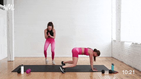 one woman performing a bear crawl fast feet HIIT cardio ab exercise and one woman performing fast feet from standing