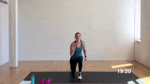 woman performing a runner lunge in a superset workout