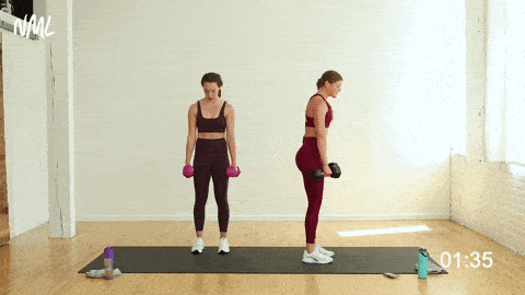 two women performing a dumbbell deadlift and back row in a full body strength workout