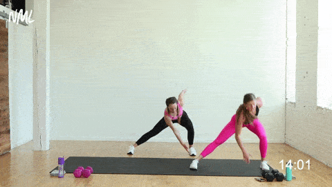 two women performing a lateral lunge and lunge jump switch in a strength and conditioning workout