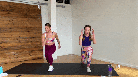 two women performing lunge jumps as part of the best bodyweight Tabata exercises