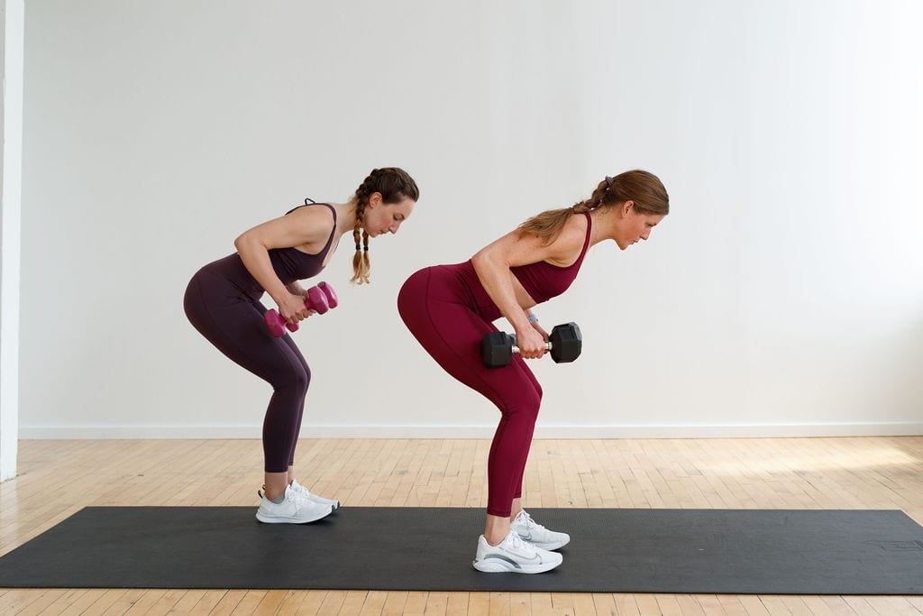 two women doing a dumbbell deadlift and back row | full body strength workout