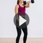 Pin for Pinterest of woman performing dumbbell chest exercises in a chest workout