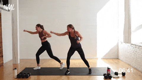 two women performing a jab, beat down and lateral shuffle in a no equipment cardio workout at home