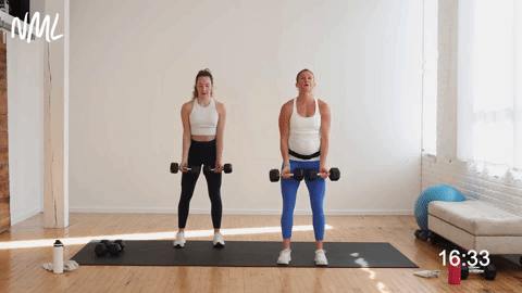 two women performing a reverse grip front raise and lateral raises in a chest and arm workout