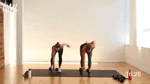 two women performing a deadlift with dumbbells and a powerful dumbbell snatch