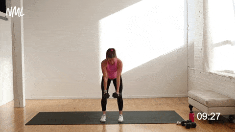 pregnant woman performing narrow back rows in a prenatal arm workout