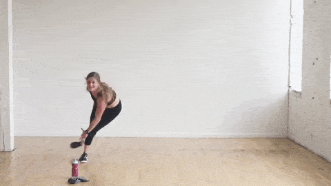 woman doing side to side speed skaters | hiit cardio workout