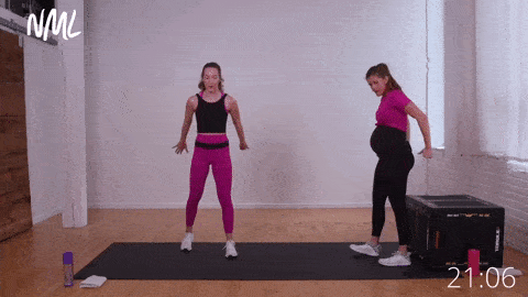 two women performing staggered single leg squats. The woman on the right sits to a box to make this a pregnancy safe exercise. 