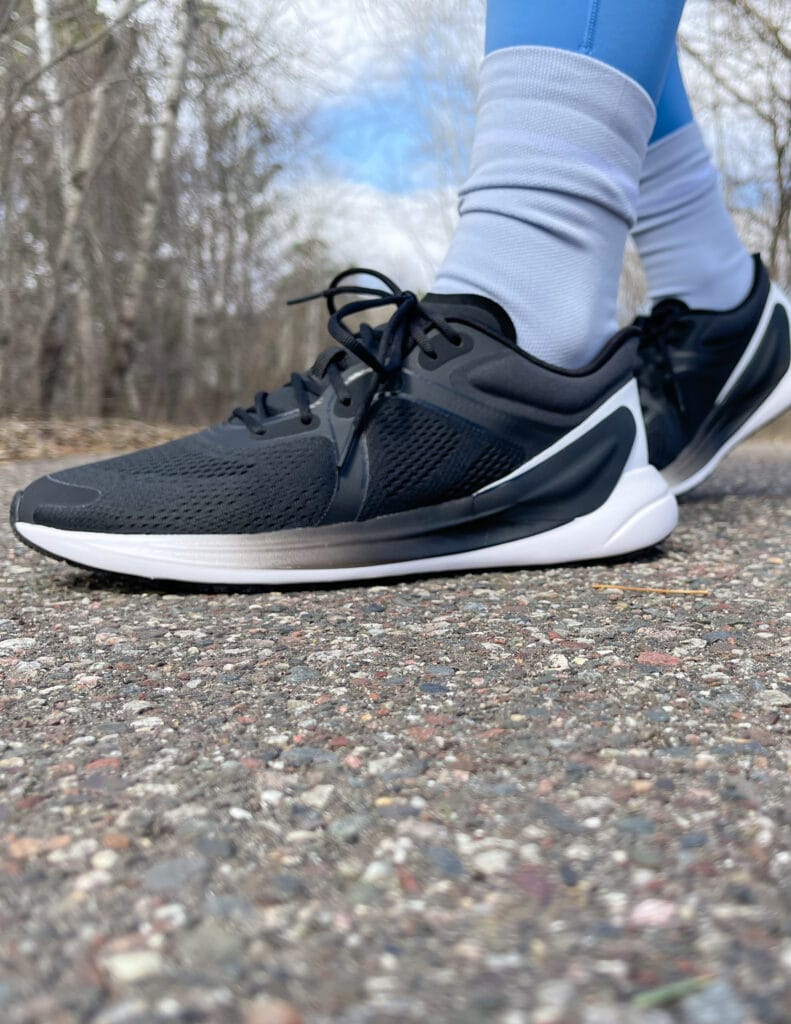 close up shot of the lululemon blissfeel running shoes for women in black and white