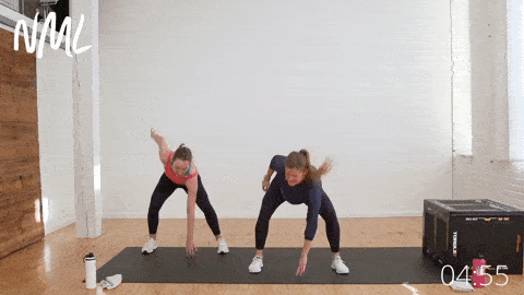 two women performing low impact lateral shuffles as part of prenatal cardio workout