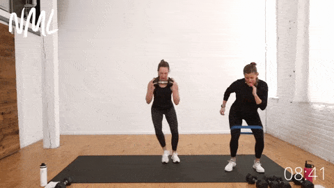 two women performing lateral banded walks