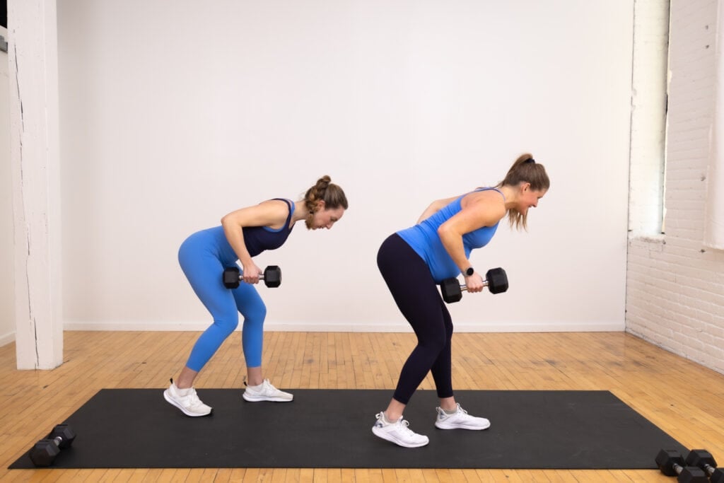 two women performing bent over back rows
