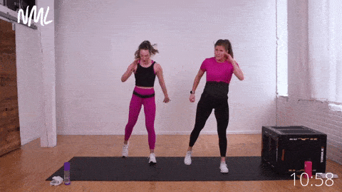 Two women performing rapid runner squats, low impact cardio in a bodyweight prenatal workout at home