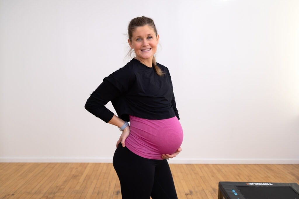 pregnant woman demonstrating sciatica during pregnancy