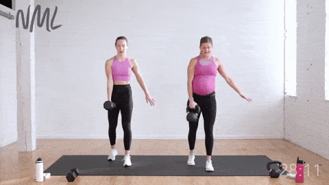 two women performing a single leg deadlift and row with kettlebells