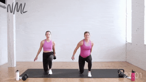 two women performing uneven lunge swings with a kettlebell to target the glutes and hamstrings