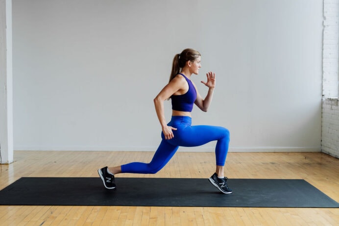 woman performing a reverse lunge