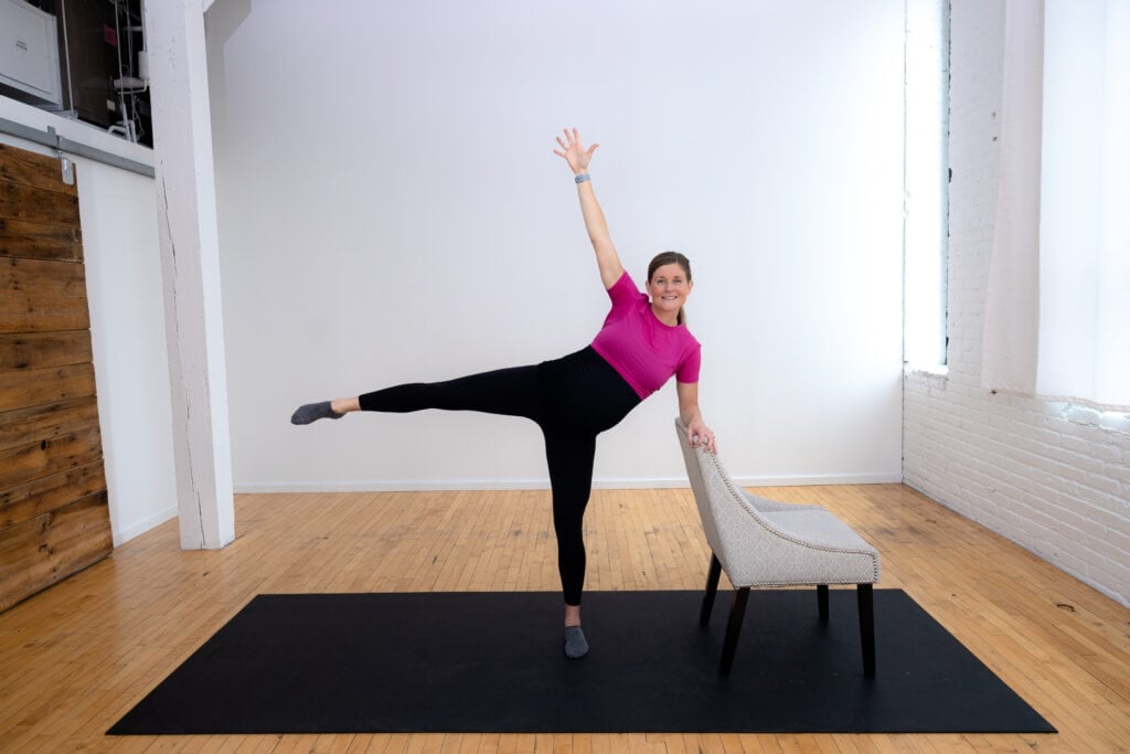 pregnancy barre workout (leg kickout and overhead reach)