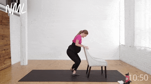 pregnant woman performing arabbesque leg lifts 
