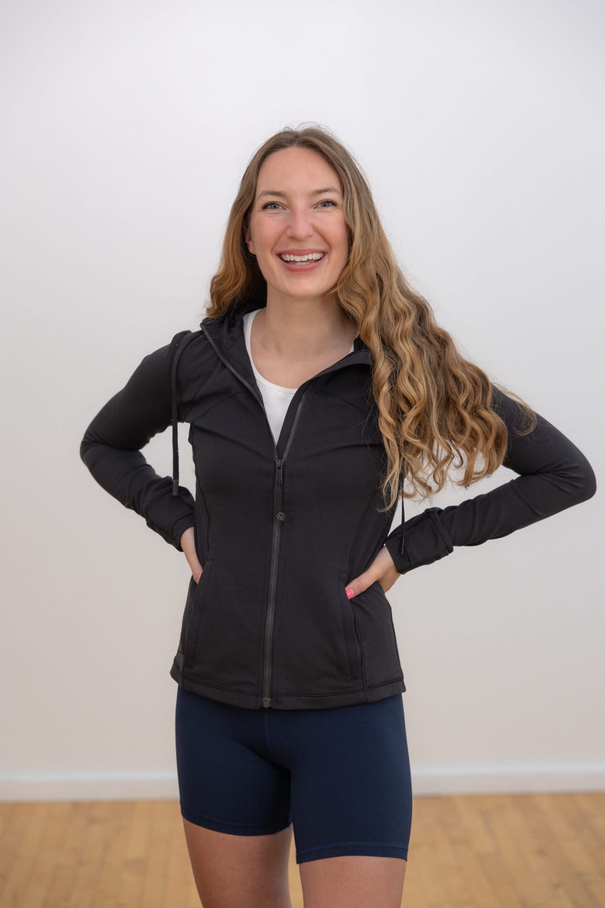 Woman wearing hooded define jacket from lululemon