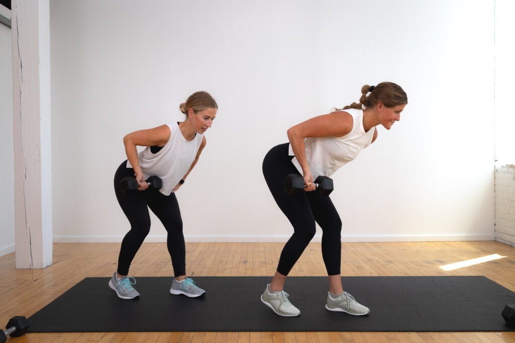 two women performing a staggered back row as part of beginner arm workout