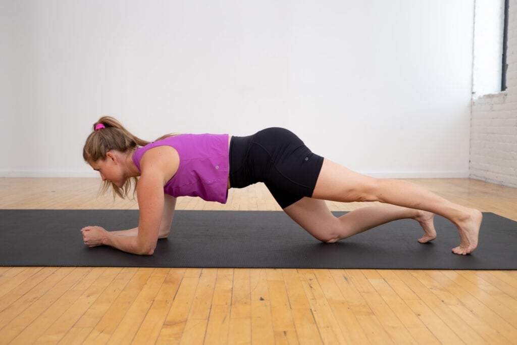 rolling low plank exercise as part of postpartum recovery ab workout