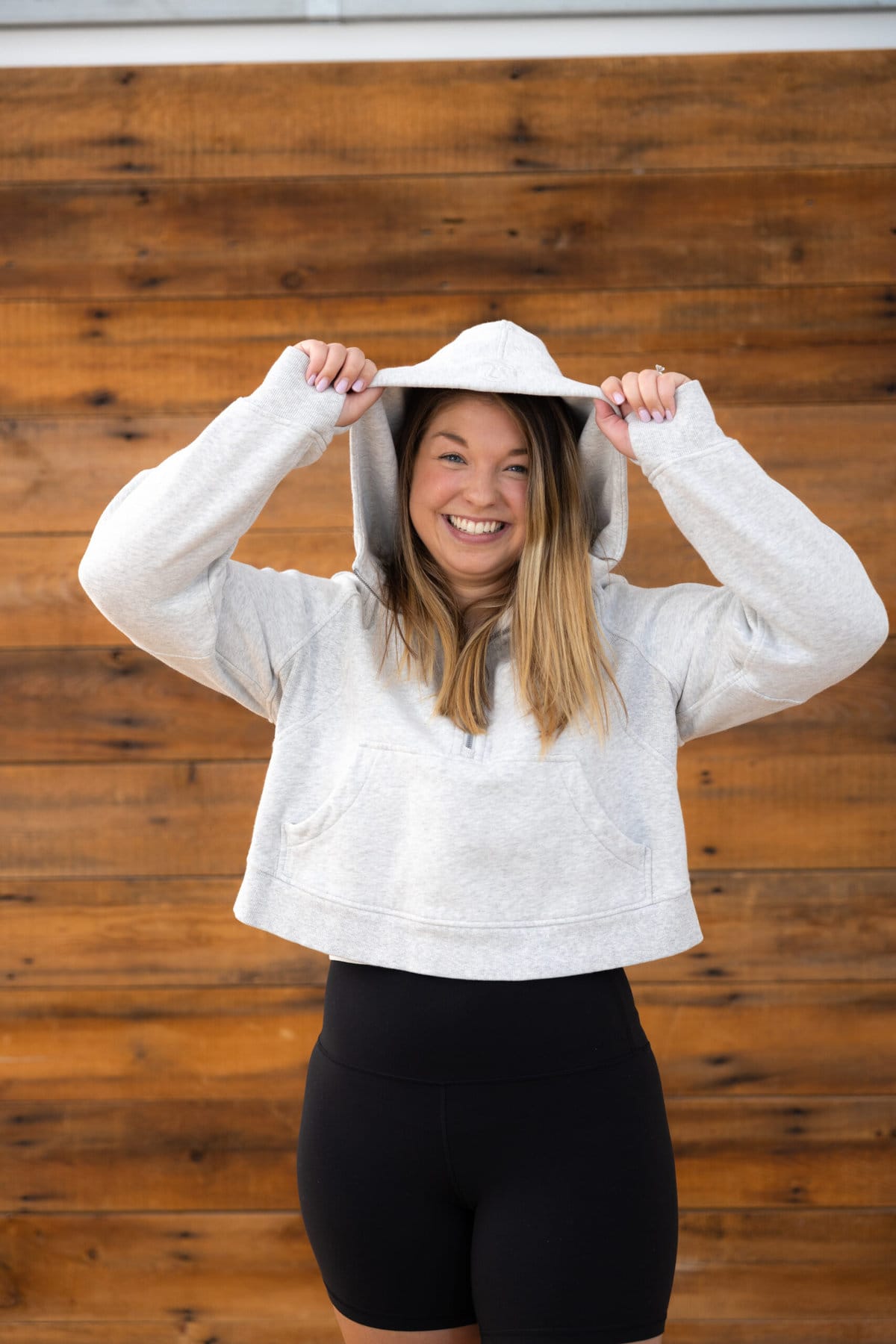 woman wearing hooded scuba sweatshirt from lululemon