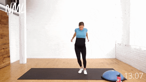 pregnant woman performing side to side taps and thigh pull in to induce labor