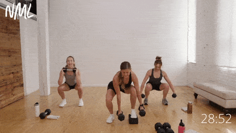 three women performing a single leg exercise (reverse lunge and step into squat)