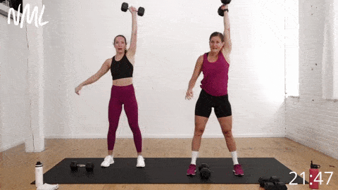 two women performing a snatch and push up combo move as part of pyramid workout