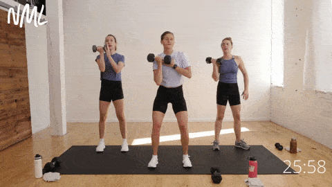 three women performing a rotational press as part of unilateral training workout