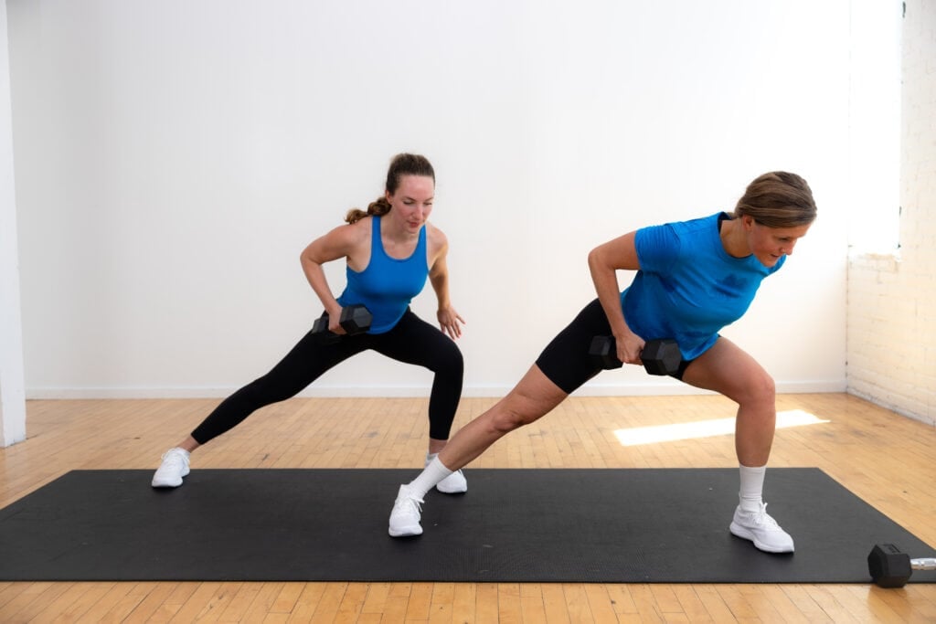 two women performing a lateral lunge and back row as example of strength training exercise for women