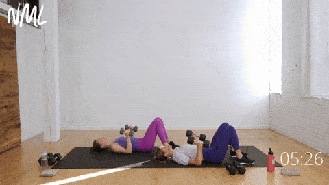two women performing a chest press from the ground and three skull crushers in an arm and shoulder workout