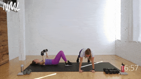 one woman performing a push up and two arm reaches while another woman performs a dumbbell chest press as a modification