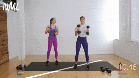 two women performing single, single, double arm punches in an arm and shoulder workout