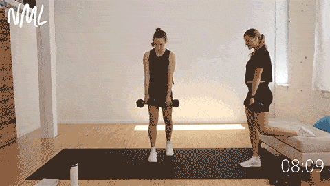 two women performing rear foot elevated deadlifts as part of best hamstring exercises workout
